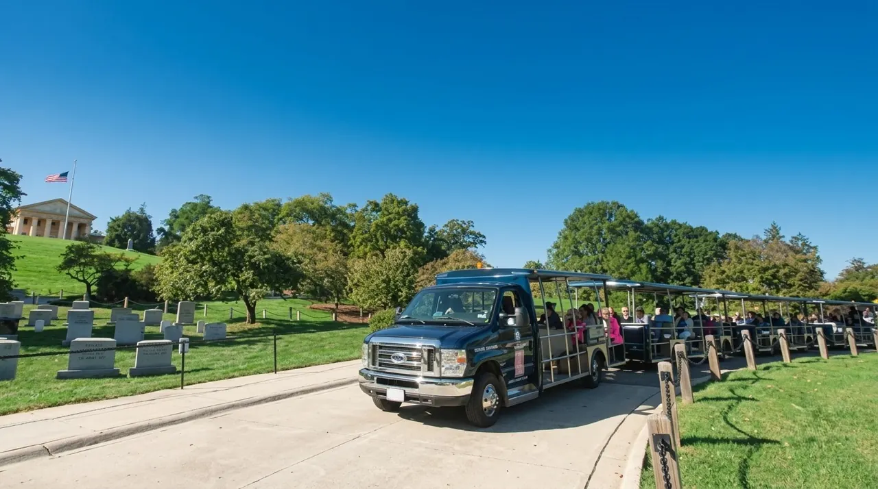 Arlington National Cemetery hop-on hop-off tram passing historic gravesites