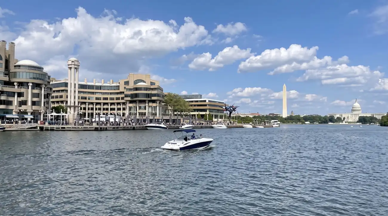 Washington Monument and US Capitol skyline from a river cruise at the Georgetown waterfront